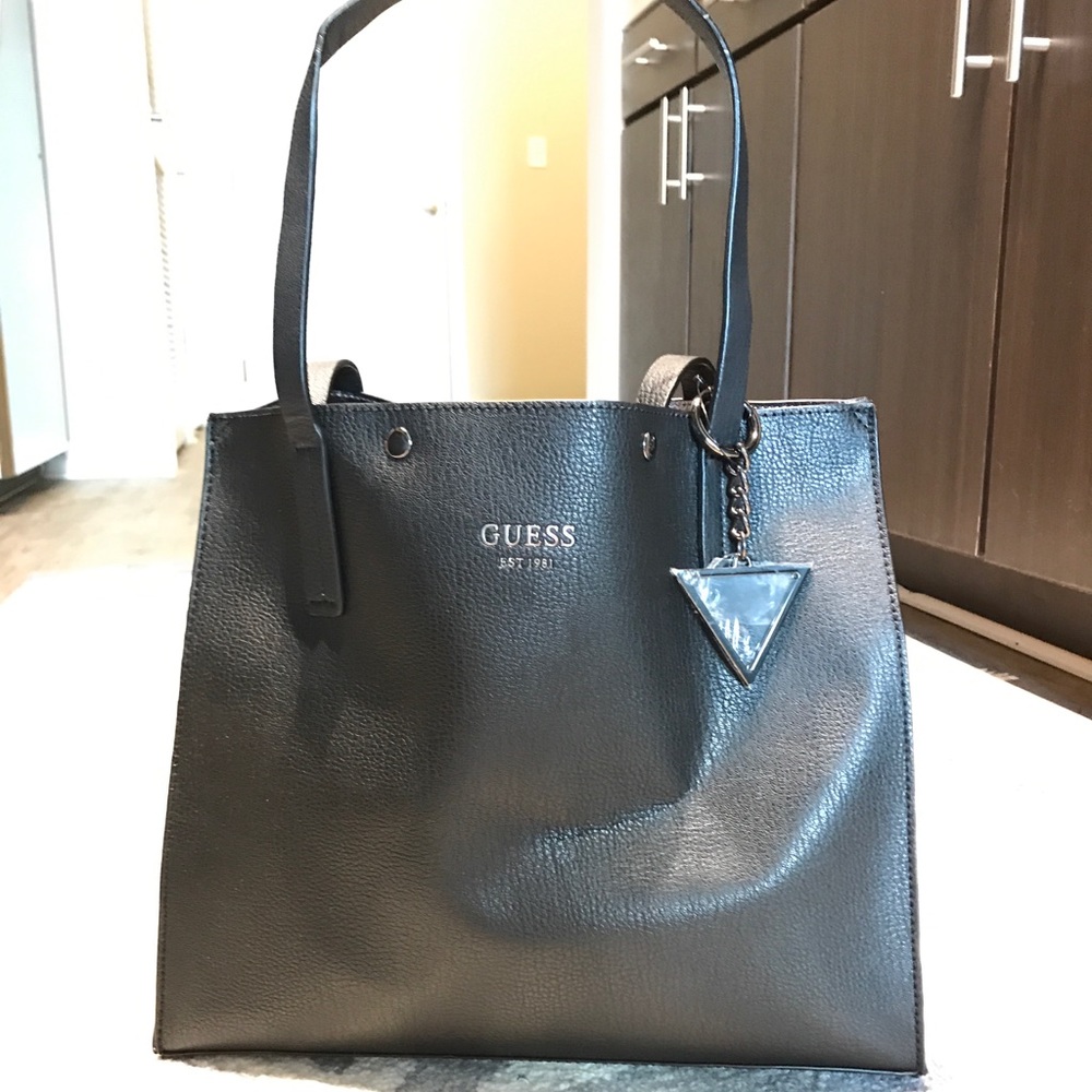 Black Guess handbag w/ matching makeup bag